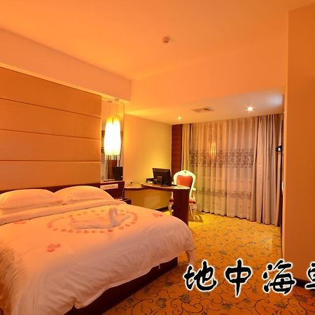 Huangma Holiday Hotel Haikou  Rum bild