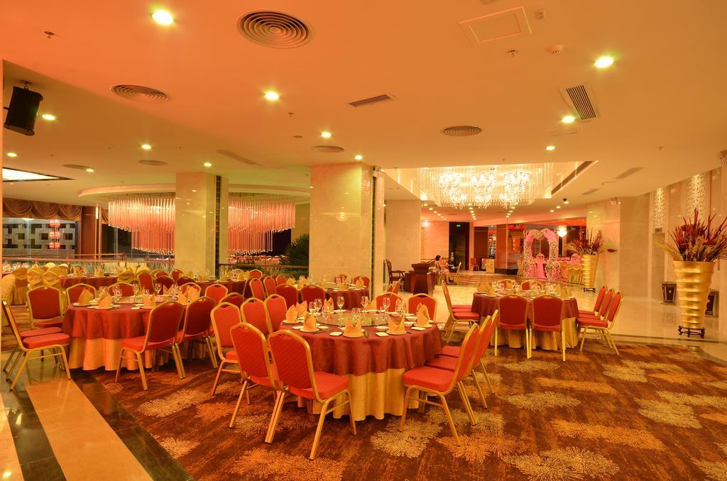Huangma Holiday Hotel Haikou  Exteriör bild